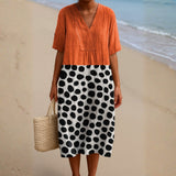 Mercedes - Orange Dress with Contrasting Polka Dots