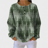 Inès – Green Jumper with Classic Christmas Tree Pattern